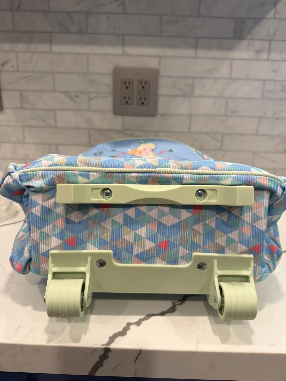 Frozen rolling backpack